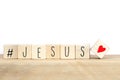 Wooden cubes with a hashtag and the word Jesus, social media concept God is love concept text background Royalty Free Stock Photo