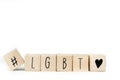 Wooden cubes with a Hashtag and the word LGBT isolated on white, lesbien,gay,bisexual,transgender and social media