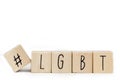 Wooden cubes with a Hashtag and the word LGBT isolated on white, lesbien,gay,bisexual,transgender and social media