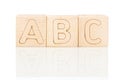 Wooden cubes with letters ABC on a white background Royalty Free Stock Photo