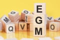 Word egm from wooden blocks with letters, concept