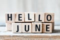 Wooden cubes with letters, hello June Royalty Free Stock Photo