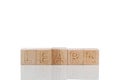 Wooden cubes with letters learn on a white background