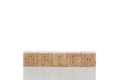 Wooden cubes with letters often on a white background