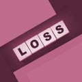 Wooden cubes with LOSS word on blacktable. Financial loss busines concept