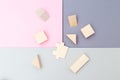 Wooden cubes on pastels color background. Education toys