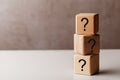 Wooden cubes with question mark, FAQ concept Royalty Free Stock Photo