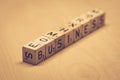 Wooden cubes showing the word business on a table Royalty Free Stock Photo