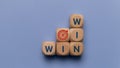 Wooden cubes with Target goal icon and win-win situation. Wooden cubes stack with text win-win situation. copy space Royalty Free Stock Photo