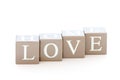 Wooden cubes wit the word love spelled Royalty Free Stock Photo