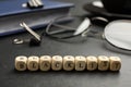 Wooden cubes with word Blacklist and office stationery on black desk, closeup Royalty Free Stock Photo