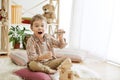 Wooden cubes with word EQUALITY in hands of little boy Royalty Free Stock Photo