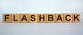 Wooden cubes with word `flashback`. Beautiful white background. Business and educational concept. Copy space Royalty Free Stock Photo