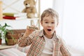 Wooden cubes with word SCHOOL in hands of little boy Royalty Free Stock Photo