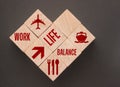 Wooden Cubes with words on them: Work Life Balance and icons. Business and enjoy choice and priority concept Royalty Free Stock Photo