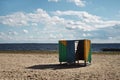 Wooden cubicle changing rooms on beach