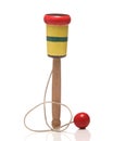 Wooden Cup-and-ball ball in cup toy. Royalty Free Stock Photo