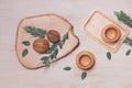 Wooden cup on wooden plate on woodenbackground