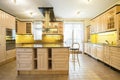 Wooden cupboards in luxury kitchen
