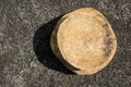 wooden cutting board, circular, ( telenan ) with the sun\'s shadow Royalty Free Stock Photo