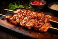 A wooden cutting board displaying tasty chicken skewers ready to be grilled or served, Grilled teriyaki chicken skewers, AI