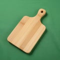 Wooden cutting board with a handle featuring a rectangular shape and rounded Royalty Free Stock Photo