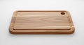 Wooden cutting board with a rectangular shape and rounded corners, featuring a Royalty Free Stock Photo