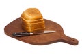 Wooden cutting board with sliced white bread and knife Royalty Free Stock Photo
