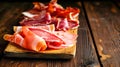 Wooden Cutting Board With Slices of Jamon Ham