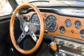 Wooden dashboard of a vintage car Royalty Free Stock Photo