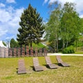 Wooden deckchairs in the park