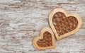 Wooden decorative hearts on the old wood