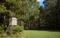 Wooden deer stand on forest edge