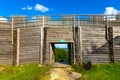 Wooden defense walls and gate of Gora Birow Mountain stronghold near Ogrodzieniec Castle in Silesia region in Poland