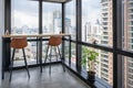 Wooden desk with chairs at corner modern office