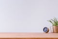Wooden desk and empty wall Royalty Free Stock Photo