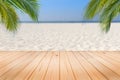 Wooden desk or plank on sand beach in summer. background. Royalty Free Stock Photo