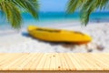 Wooden desk or plank on sand beach in summer. background. Royalty Free Stock Photo