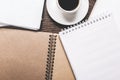 Wooden desktop with spiral organizer and coffee