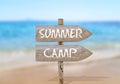 Wooden direction sign with summer camp Royalty Free Stock Photo