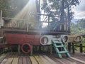 Wooden Display Boat Basked in Sunlight