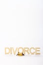 Wooden divorce sign with miniature figure couple