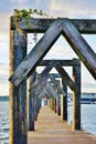 Wooden Dock on the Bay with Geometric Arches Royalty Free Stock Photo