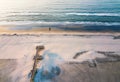 Wooden dock on a empty beach aerial view