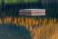 A wooden dock floating in the water