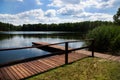 Wooden dock, pier on a lake Royalty Free Stock Photo