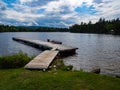 Wooden Dock on Shore of River in Maine Royalty Free Stock Photo