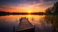 a wooden dock sitting in the middle of a lake at sunset Royalty Free Stock Photo