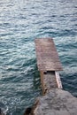 Wooden dock and small waves Royalty Free Stock Photo