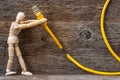 Wooden doll and internet cable Royalty Free Stock Photo